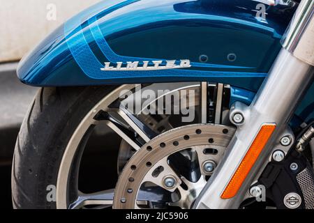 2022 Harley-Davidson Road Glide Limited Motorcycle on asphalt parking at spring day - close side view on front wheel fender in Tula, Russia - June 5, Stock Photo
