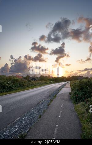 A lighthouse during sunset in Denmark Stock Photo