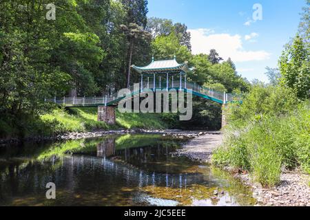 The Chinese Bridge, designed by Weir Schultz in 1899 to be constructed over the Lugar river on the Dumfries Estate, near Cumnock. Scotland, UK Stock Photo