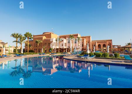 Swimming pool of the Club Calimera Akassia Swiss Resort, Hotel on the Red Sea coast frequented by many European tourists. Stock Photo