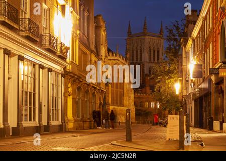 Night falls on Trinity Street in Cambridge, England. Stock Photo
