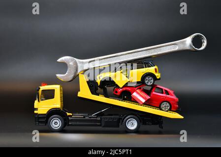 broken toy cars with wrench tool Stock Photo