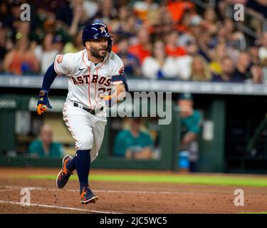 Houston Astros' Jose Altuve runs after his 2,000th career hit, a single ...