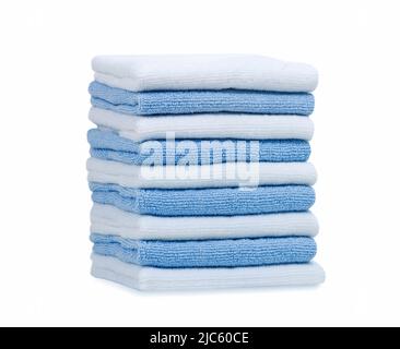 Stack of blue and white towels isolated,household.Colorful towels on white background. Stock Photo