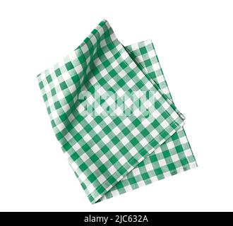 Green checkered folded cloth isolated on white,kitchen picnic towel top view. Stock Photo