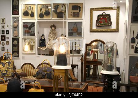 Bucharest, Romania. Inside the showroom of the famous fashion designer Dan Coma, with a display of luxurious handbags. Stock Photo