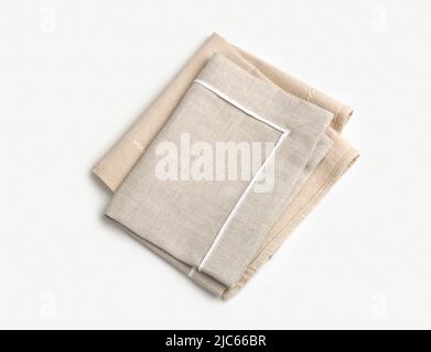 Folded kitchen cloth top view. Beige burlap towels. Dishcloth. Stock Photo