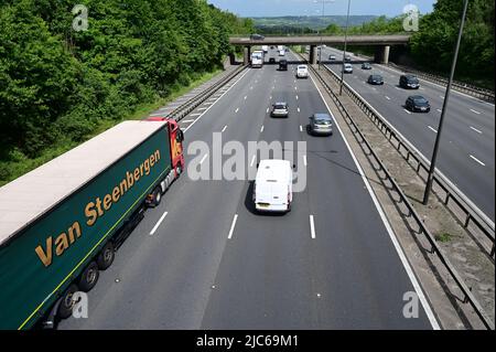 Reigate, Surrey, UK- June 10 2022:  M25 looking down from Junction 8 at traffic heading in an Easterly direction. Stock Photo