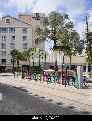 ORANJESTAD, ARUBA - DECEMBER 4, 2021: Plaza Daniel Leo square with Renaissance Resort Hotel, Renaissance Mall and Green Bike rental station on Aruba Stock Photo