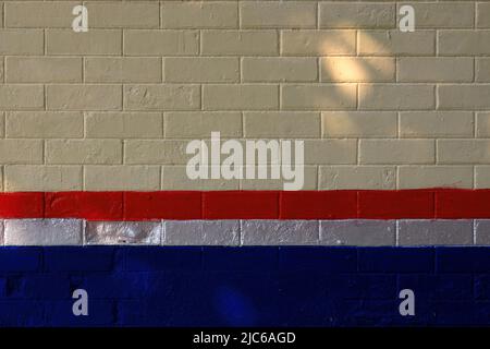 Multi Color painting on brick wall, wide panorama of masonry, bricklaying Stock Photo