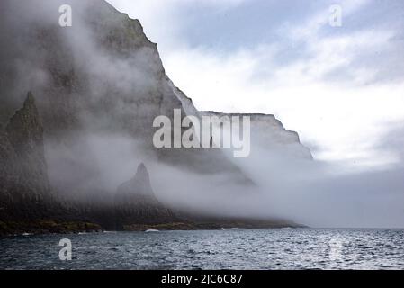 Imposing Vestmanna sea cliffs, Streymoy Island, Faroe Islands Stock Photo