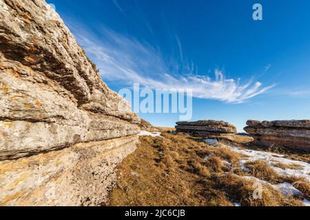 Group of rock karst formations on Lessinia High Plateau (Altopiano della Lessinia), Regional Natural Park in Verona Province, Veneto, Italy, Europe. Stock Photo