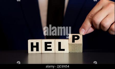 dice forming the word HELP Stock Photo