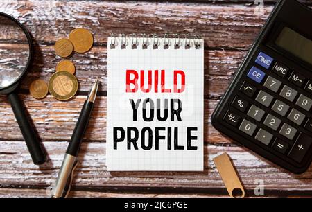 text Build your profile on torn paper, business concept Stock Photo