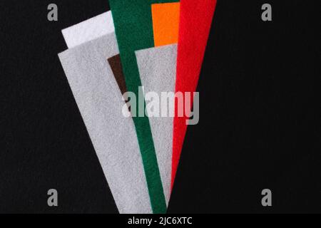 Several colored felt texture background. Assorted color felt fabric sheets, patchwork, sewing DIY craft Stock Photo