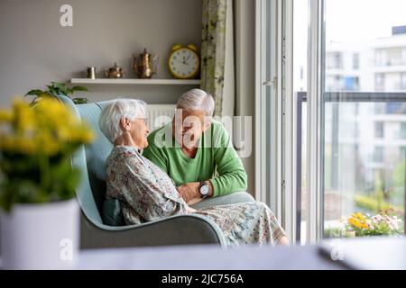 Happy senior couple at home Stock Photo