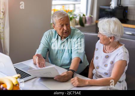 Senior couple going through their financials problems