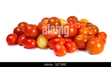 Various mini tomatoes against a white background Stock Photo