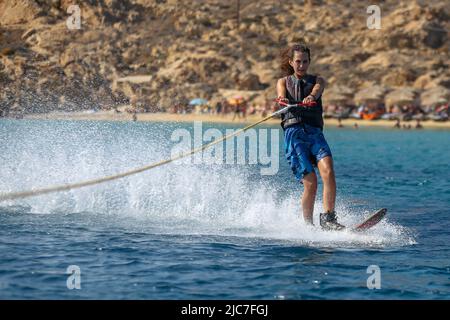 Performing Water Mono Ski Slalom at Elia Beach in Mykonos Stock Photo