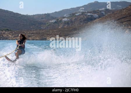 Performing Water Mono Ski Slalom at Elia Beach in Mykonos Stock Photo