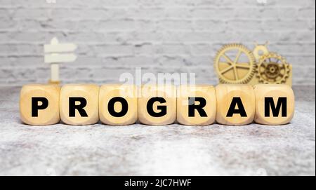 inscription upgrade on wooden cubes. Updating and upgrading, improving programs and products. Updated version, blue background Stock Photo
