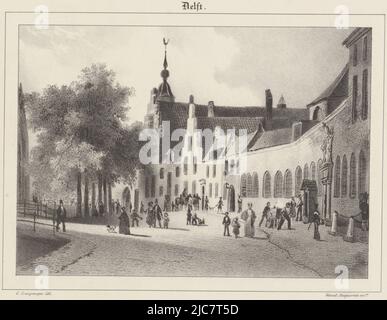 Figures walking in the street. A soldier stands guard in front of the barracks. On the left is a moat and some trees, Kazerne in Delft Views of Dutch Cities , print maker: Gijsbertus Craeyvanger, (mentioned on object), printer: Desguerrois & Co., (mentioned on object), print maker: Netherlands, printer: Amsterdam, 1820 - 1895, paper, h 270 mm × w 340 mm Stock Photo