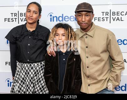 Pharrell Williams honored with a star on the Hollywood Walk of Fame  Featuring: Pharrell Williams,Helen Lasichanh,Rocket Ayer Williams,Family  Where: Hollywood, California, United States When: 04 Dec 2014 Credit:  FayesVision/WENN.com Stock Photo 