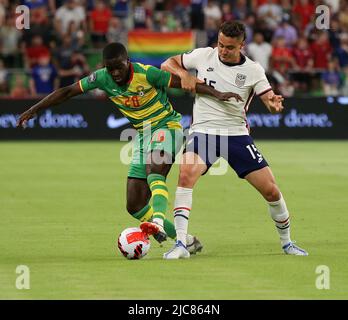 Austin, Texas, USA. 10th June, 2022. United States defender Aaron Long (15) works against Grenada forward Jacob Berkeley Agyepong (20) during a Concacaf Nations League match on June 10, 2022 in Austin, Texas. (Credit Image: © Scott Coleman/ZUMA Press Wire) Credit: ZUMA Press, Inc./Alamy Live News Stock Photo