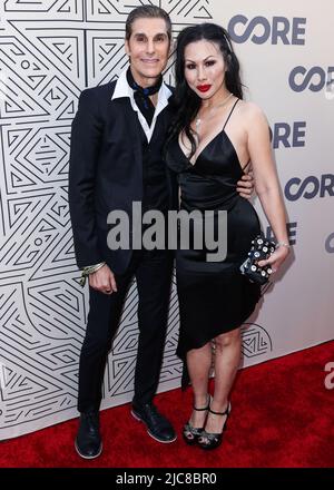 Perry Farrell with his wife Etty Lau Farrell attend the Jennifer Lopez