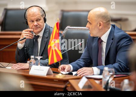 Skopje, North Macedonia. 11th June, 2022. German Chancellor Olaf Scholz (l, SPD), sits next to Prime Minister Dimitar Kovacevski in northern Macedonia. On the second day of his Balkan trip, Scholz visits northern Macedonia and Bulgaria. Credit: Michael Kappeler/dpa/Alamy Live News Stock Photo