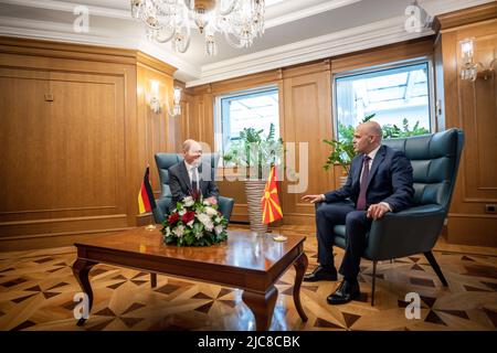 Skopje, North Macedonia. 11th June, 2022. German Chancellor Olaf Scholz (SPD), sits next to Prime Minister Dimitar Kovacevski in northern Macedonia. On the second day of his Balkan trip, Scholz visits northern Macedonia and Bulgaria. Credit: Michael Kappeler/dpa/Alamy Live News Stock Photo