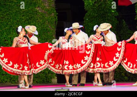 Mexican dancers dressed in stunning colorful bright costumes at 24th International Folklore Festival,Varna Bulgaria 2015 Stock Photo