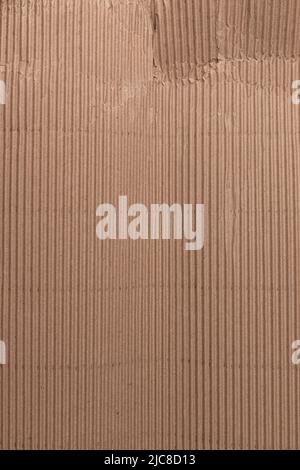 corrugated beige paper texture close up, view from above, detail for design, design elements, background for cards, postcards and posters Stock Photo