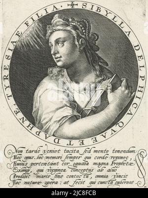 Bust of the Delfic Sibyl. In her right hand she holds a book. She looks back over her right shoulder. The scene is framed in a medallion with a border inscription in Latin. In the margin a six-line caption in Latin. Print from a series with the twelve sibyls, Delfische Sibille The twelve sibyls XII. Sibyllarum Icones Elegantissimi , print maker: Crispijn van de Passe (I), Cologne, 1601, paper, engraving, h 150 mm × w 114 mm Stock Photo