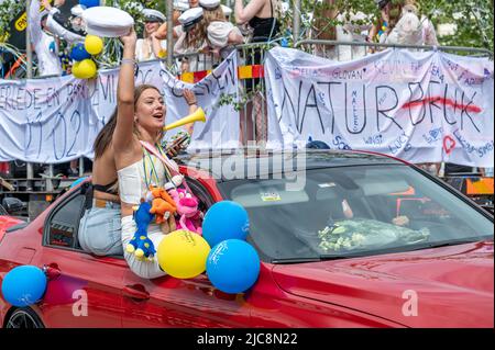 Graduation day from gymnasium in the city center of Norrkoping. Students celebrating and parading on truck beds is a tradition in many Swedish cities. Stock Photo