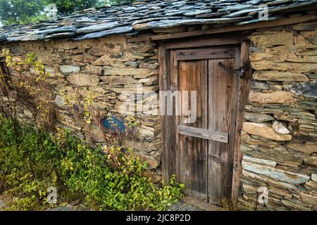 A traditional home in himalayan region of Uttarakhand India made of rocks. These small houses are also called CHANNI means house under stars. Stock Photo