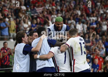 Austin, Texas USA, 10th June, 2022: USA team members celebrate a goal by PAUL ARRIOLA (7) during second half action of a CONCACAF Nation's League match at Austin's Q2 Stadium. This is the U.S. Men's National Team's (USMNT) final match in the U.S. before the 2022 FIFA World Cup. Credit: Bob Daemmrich/Alamy Live News Stock Photo