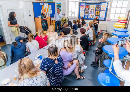 London, UK. 11 Jun 2022. Tom Molnar the founder of Gails speaks about opportunities in his business - Familes4Peace welcomes Ukrainian mums and children from across NW London to The Cavendish School in Camden. Speakers provide practical information on access to services, relocation advice and jobs while children play helped by volunteers. They benefit from coming together with others in the same predicament, hopefully helping to reduce the trauma of moving to a new country while leaving family members behind to face uncertainty and danger. ‘London stands with Ukraine'. Credit: Guy Bell/Alam Stock Photo
