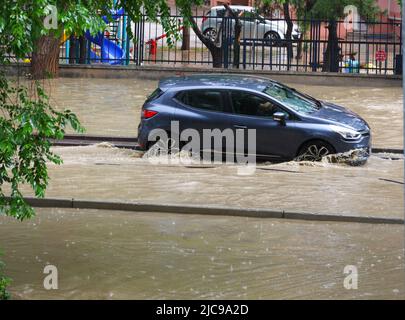 Ankara, Turkey, After the rain in Ankara manholes exploded and there was flood in streets of Bahcelievler Ankar view roads closed with flood water and cars trapped at road Credit: Del Calle/Alamy Live News Stock Photo