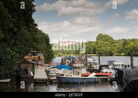 A view of The Petersham Hotel on Richmond Hill taken from the Thames at Orleans Park, London Borough of Richmond Upon Thames, London, England, UK Stock Photo