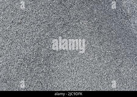 Abstract stone texture. Fine gray gravel. Small gray stones.  Building material. Panoramic photo Stock Photo