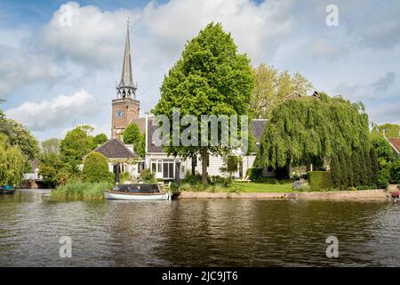 Picturesque dutch tourist village Broek in Waterland seen from the boat Stock Photo