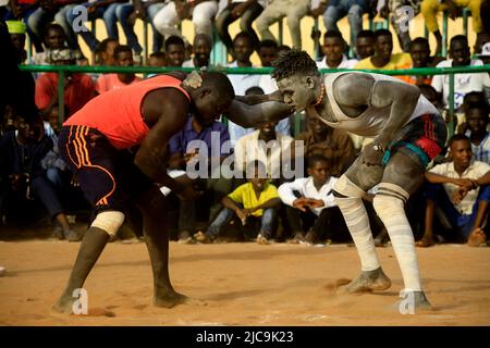 Khartmou, Sudan. 10th June, 2022. Wrestlers compete in preparation for the annual Nuba wrestling festival in Khartoum, Sudan, June 10, 2022. Credit: Mohamed Khidir/Xinhua/Alamy Live News Stock Photo