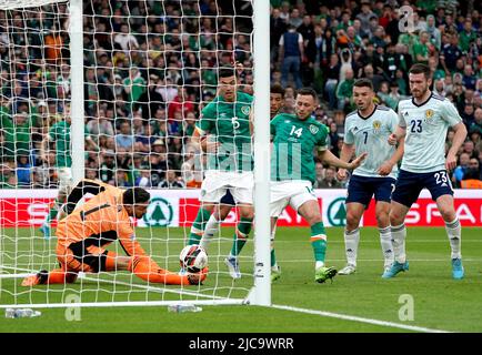 Republic of Ireland's Alan Browne (centre) scores his side's first goal of the game during the UEFA Nations League match at the Aviva Stadium, Dublin. Picture date: Saturday June 11, 2022. Stock Photo