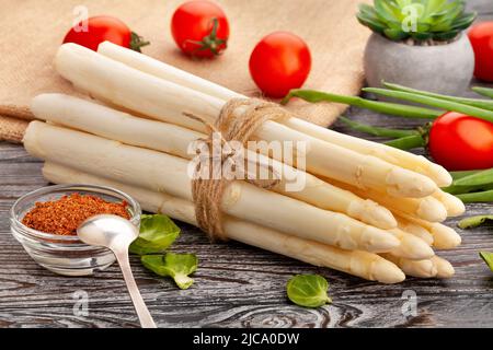 white asparagus on wood background Stock Photo