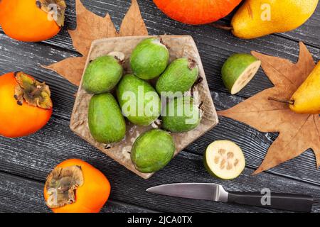 feijoa group on wood background top view Stock Photo
