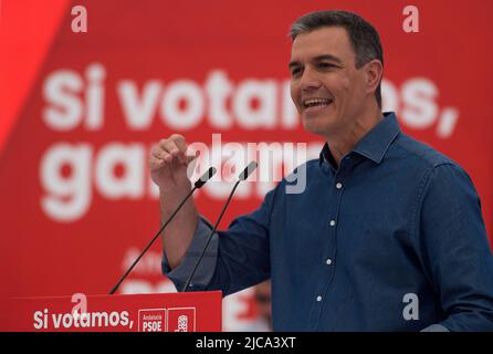 June 11, 2022, Malaga, Spain: Spanish Prime Minister, Pedro Sanchez and Socialist Party leader is seen delivering a speech during a rally for the Andalusian electoral campaign. Following the announcement of regional elections to be held on the 19th of June, the main political parties have started holding events and rallies in different cities in Andalusia. Several media polls place the Andalusian Popular Party in the lead, despite the rise of the Spanish far-right party VOX. Parties on the left of the political spectrum are fragmented. (Credit Image: © Jesus Merida/SOPA Images via ZUMA Press W Stock Photo