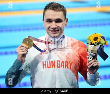 JULY 28th, 2021 - TOKYO, JAPAN: Kristof Milak of Hungary wins the Gold Medal and a new Olympic Record in 1:51.25 in the Men's 200m Butterfly Final at Stock Photo