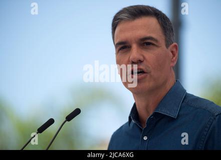 June 11, 2022, Malaga, Spain: Spanish Prime Minister, Pedro Sanchez and Socialist Party leader is seen delivering a speech during a rally for the Andalusian electoral campaign. Following the announcement of regional elections to be held on the 19th of June, the main political parties have started holding events and rallies in different cities in Andalusia. Several media polls place the Andalusian Popular Party in the lead, despite the rise of the Spanish far-right party VOX. Parties on the left of the political spectrum are fragmented. (Credit Image: © Jesus Merida/SOPA Images via ZUMA Press W Stock Photo