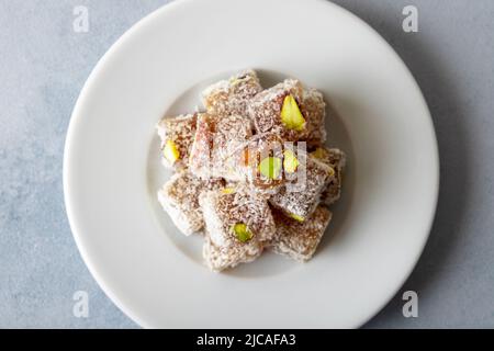 Traditional pistachio Turkish delight in a plate Stock Photo